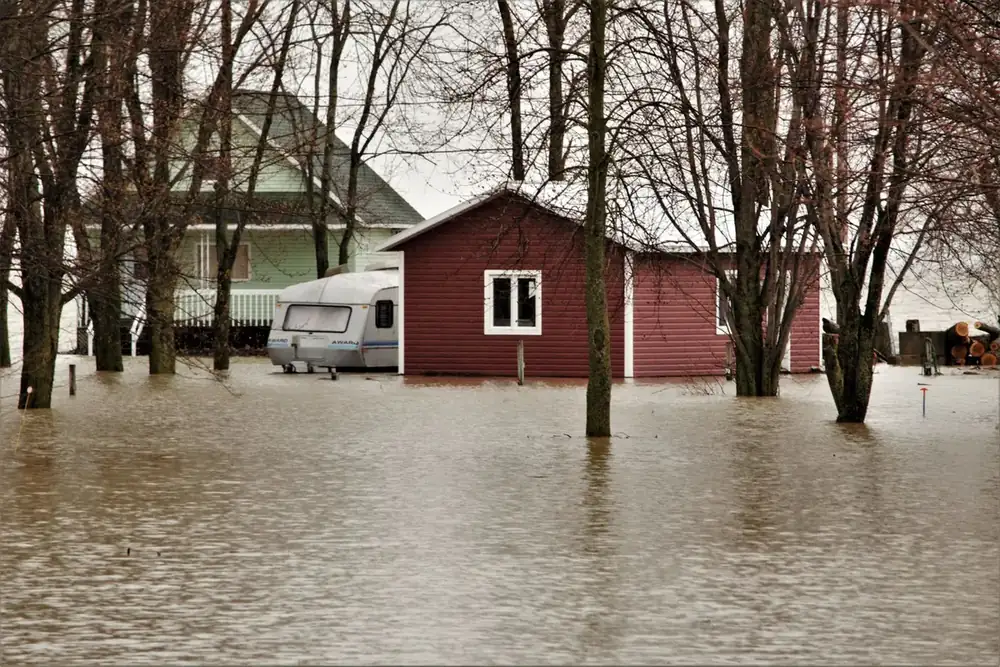 A house surrounded by floodwater after a storm in Sherman, TX